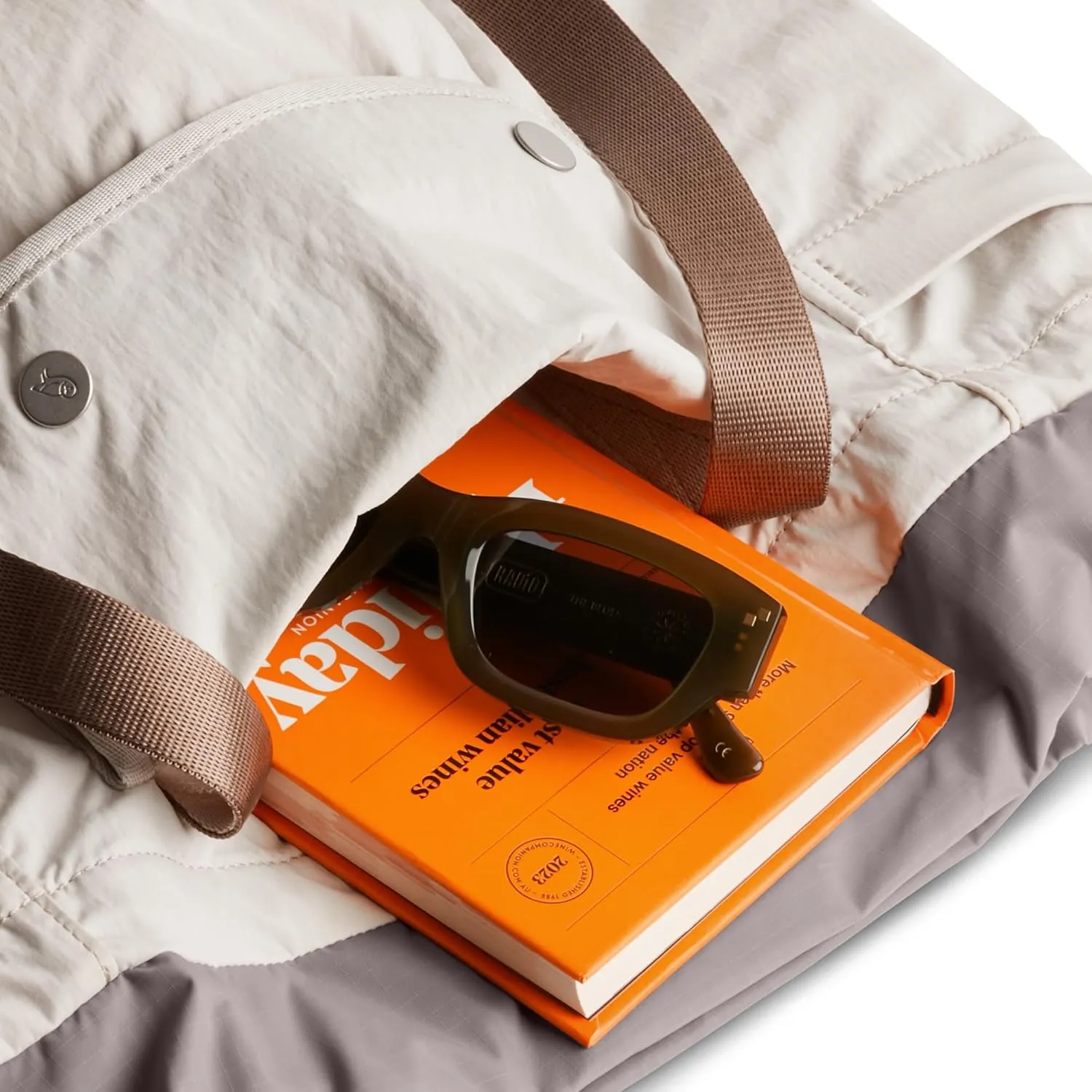 Bellroy Cinch Tote (16 liter lightweight tote bag with external organization, pop pockets, a luggage pass-through, and effortless draw-cord closure) - Oat