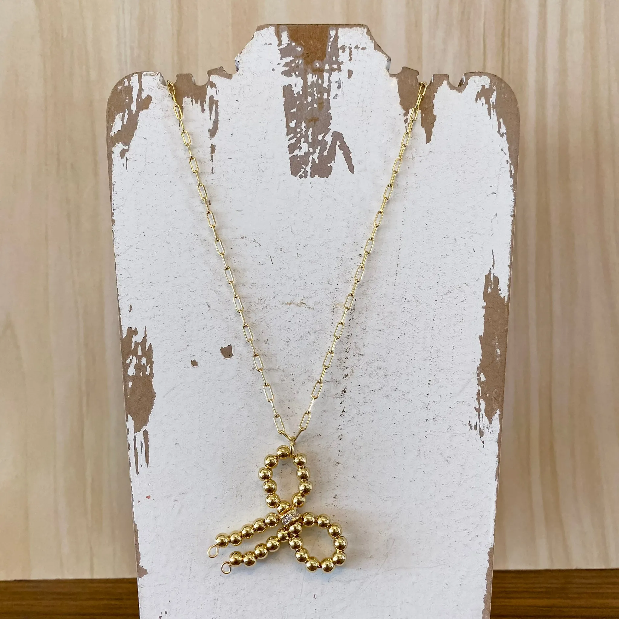 Long Beaded Bow Necklace