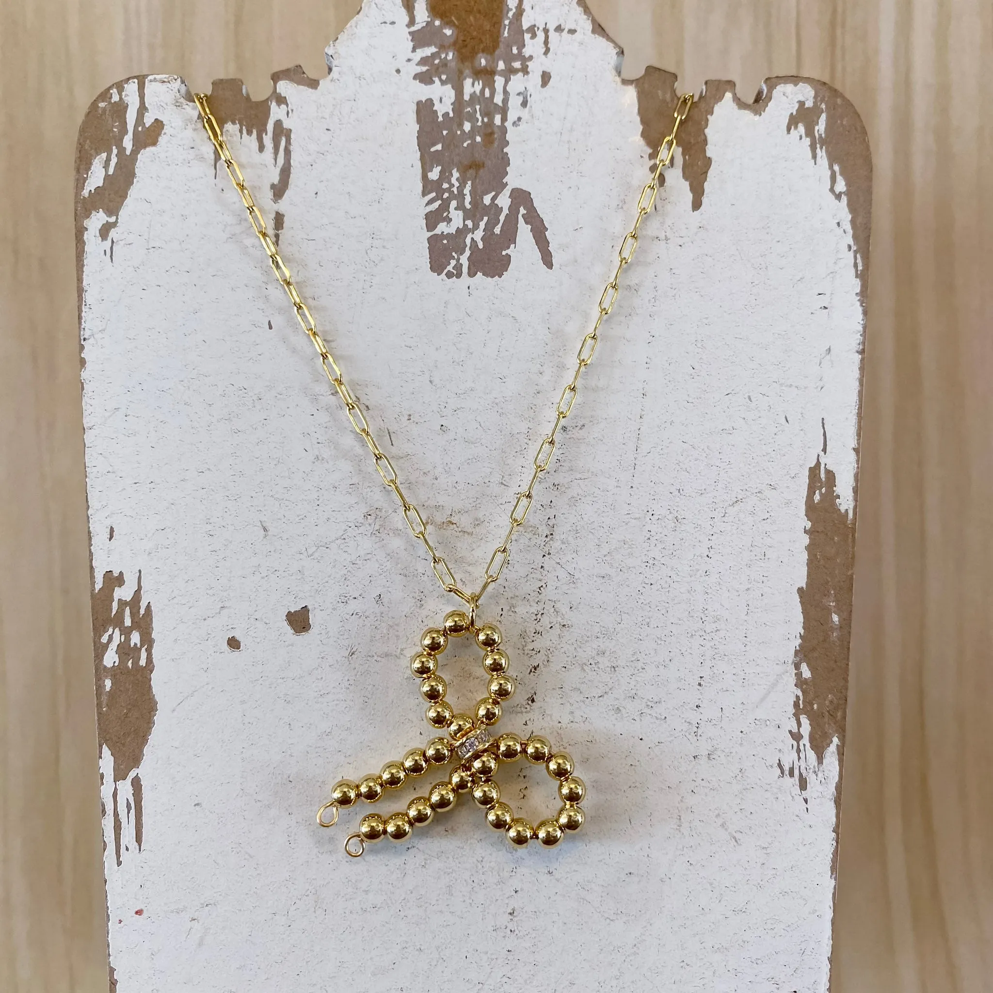 Long Beaded Bow Necklace